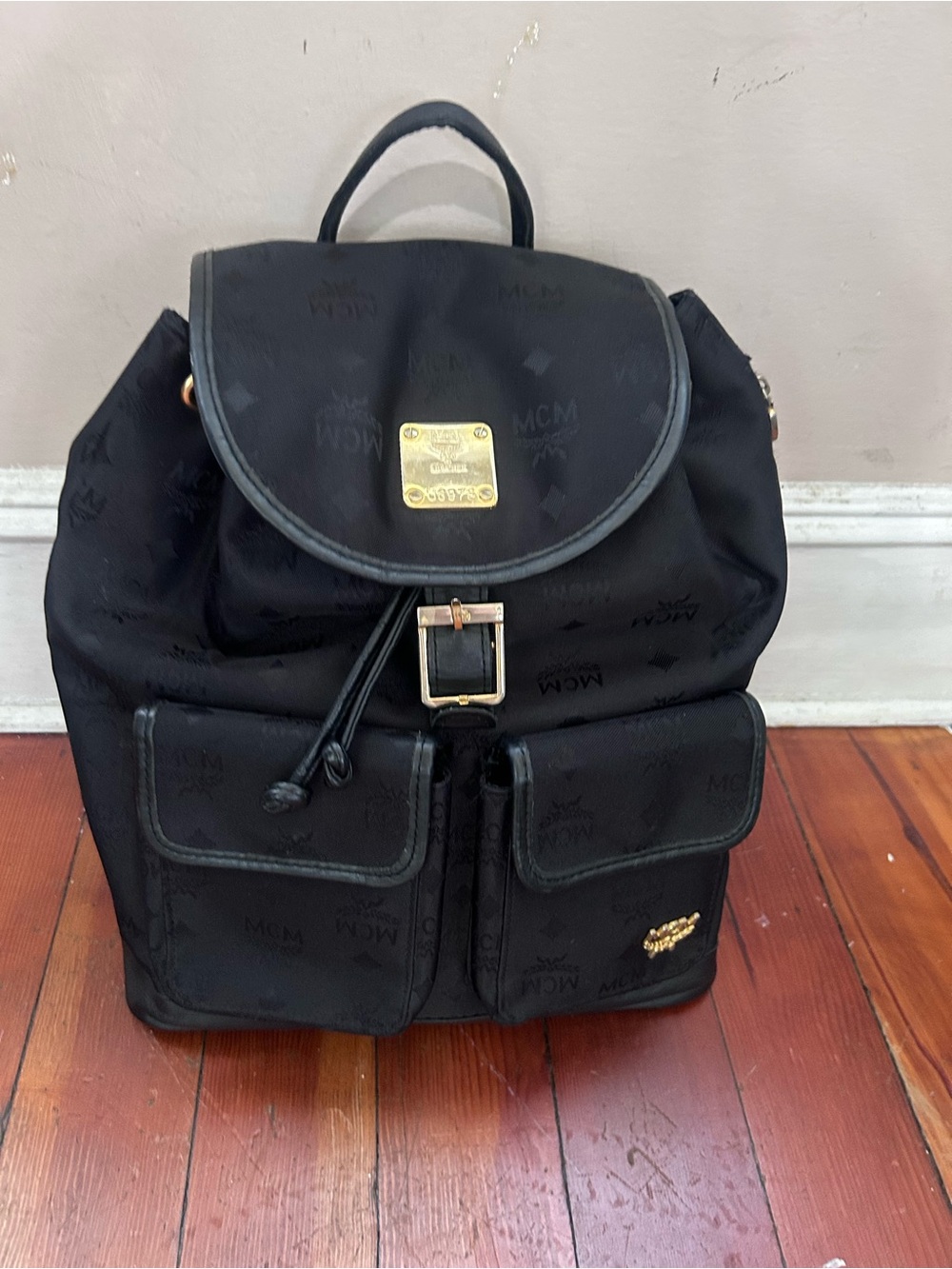 MCM Black Logo Backpack with Gold Plaque